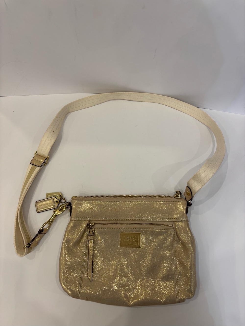 Metallic coach poppy crossbody